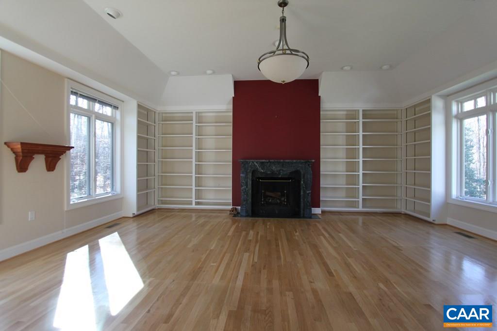 245 Terrell Road West Charlottesville, VA 22901 - Photo 21 of 23 a view of empty room with windows and fireplace