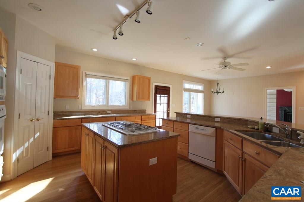 245 Terrell Road West Charlottesville, VA 22901 - Photo 6 of 23 a kitchen with stainless steel appliances granite countertop a sink stove and refrigerator