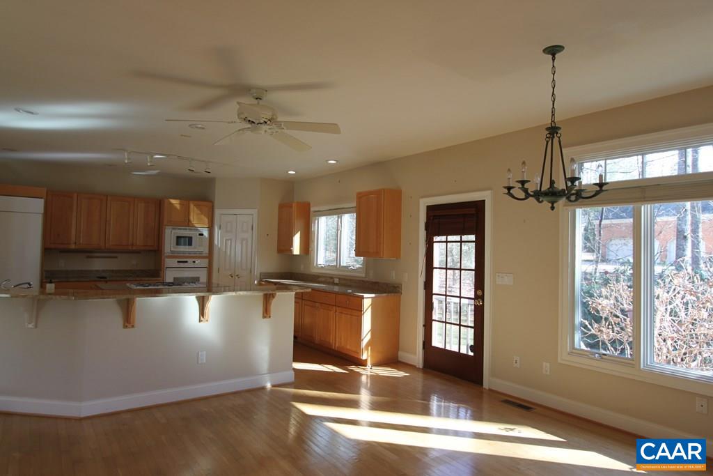 245 Terrell Road West Charlottesville, VA 22901 - Photo 7 of 23 a view of a kitchen with stainless steel appliances granite countertop a stove and a refrigerator