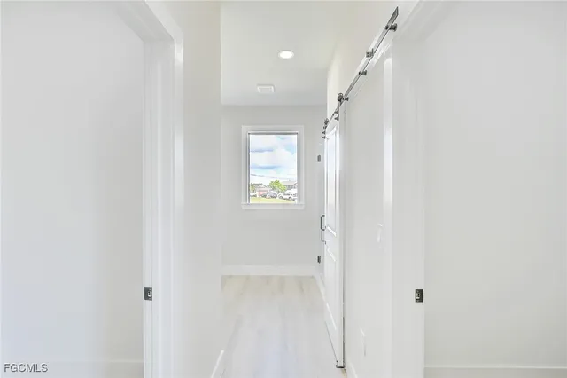 a view of an entryway with a white wall