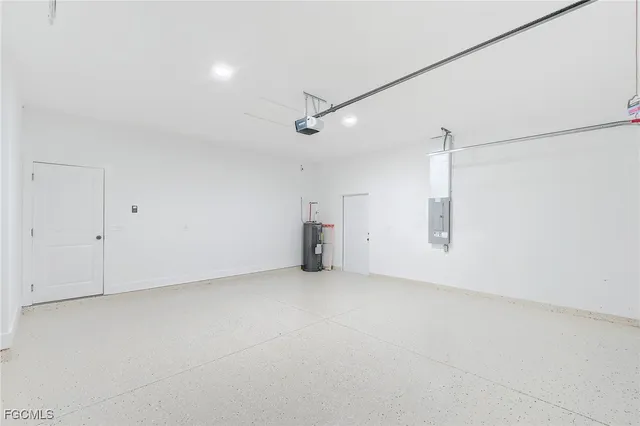 a view of empty room with ceiling fan