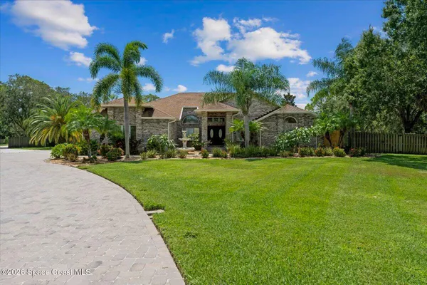 a view of swimming pool with a yard