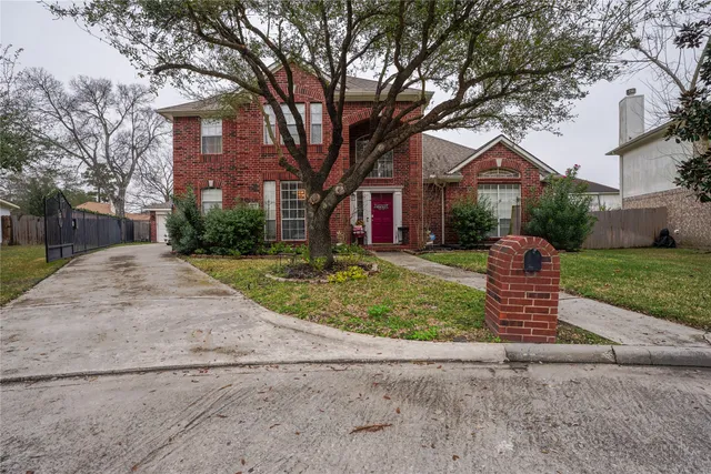 a bed sitting in a room next to a window