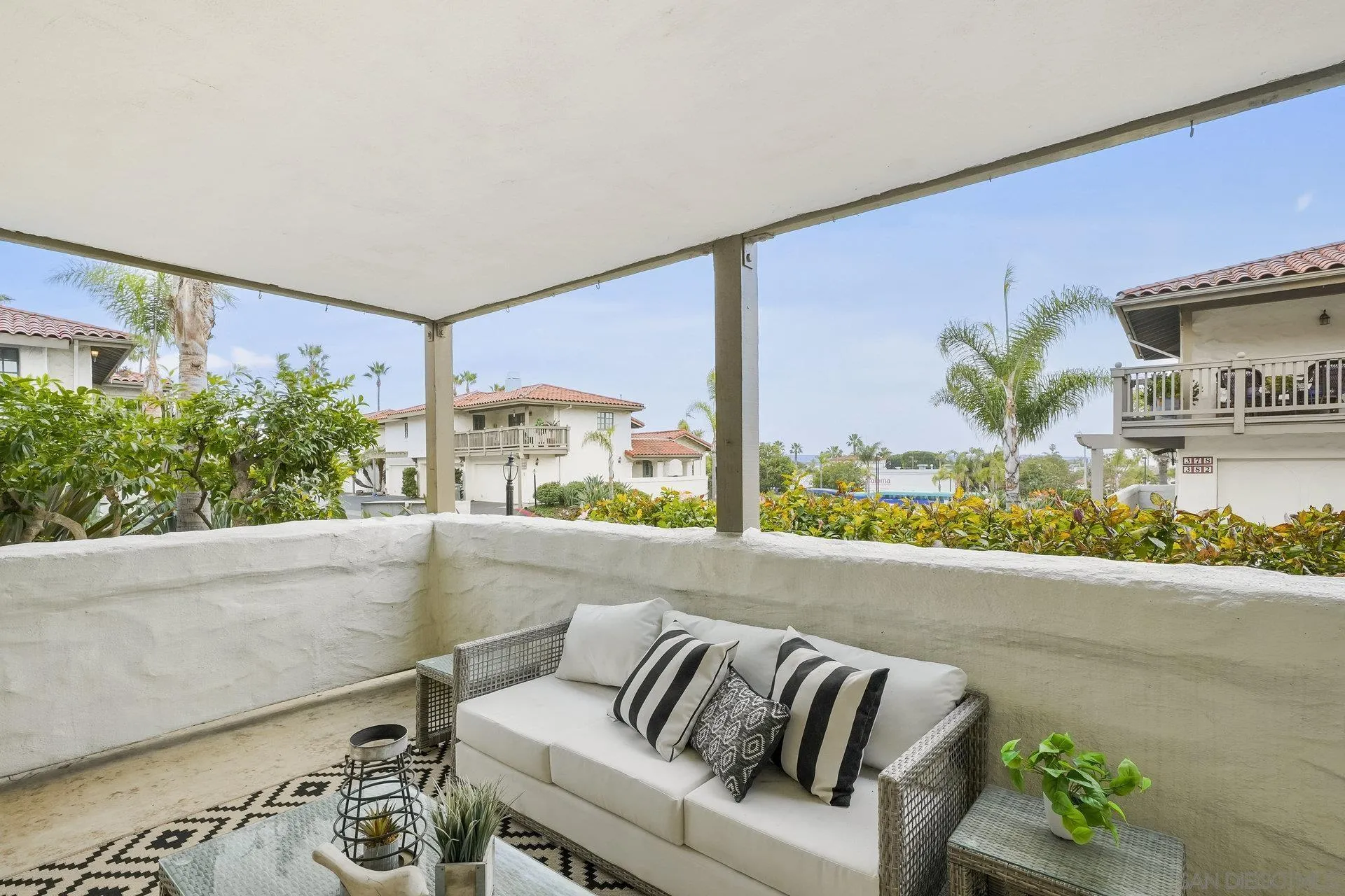 381 Playa Blanca Encinitas, CA 92024 - Photo 16 of 32 a living room with furniture and a potted plant