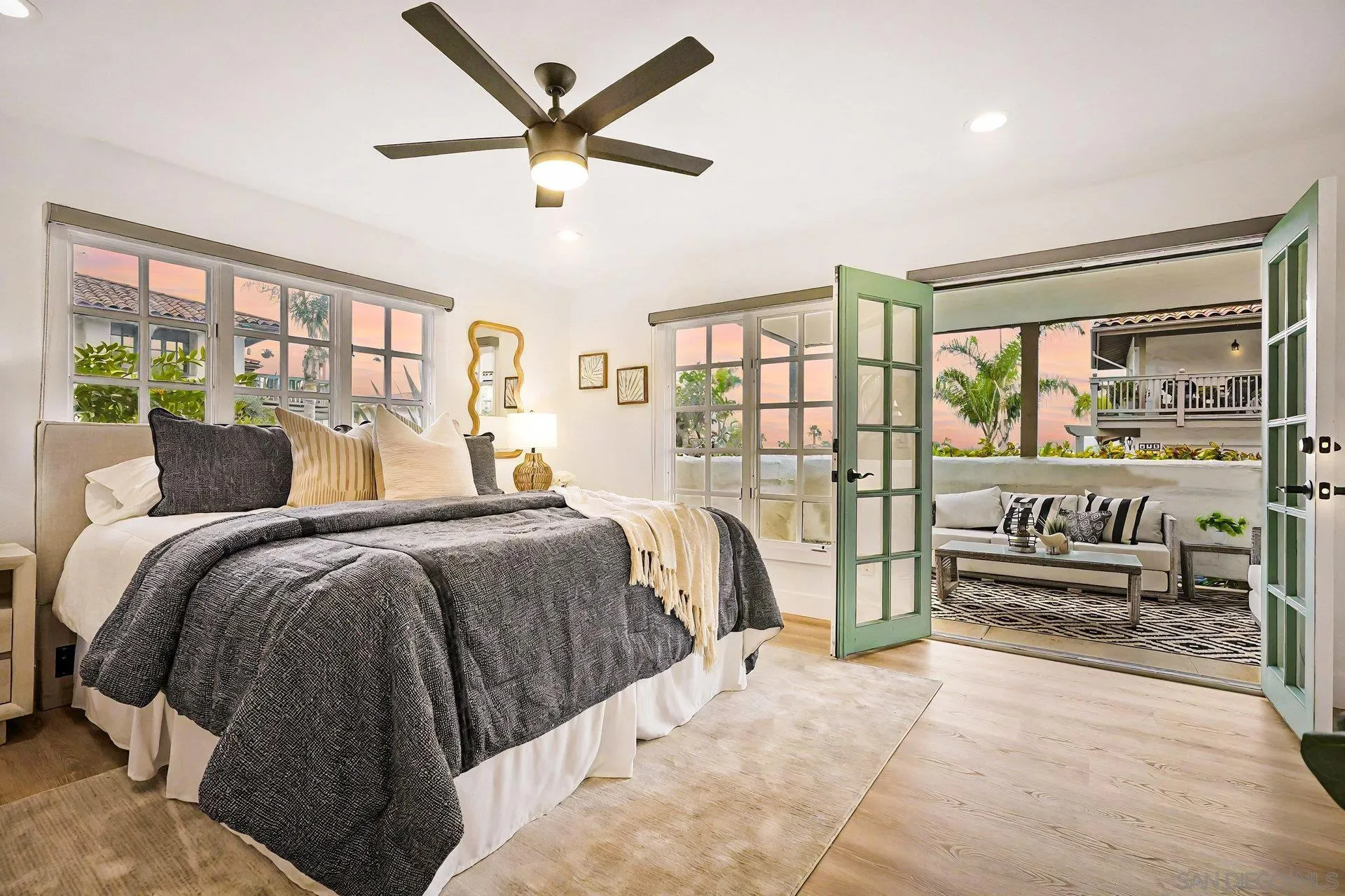 381 Playa Blanca Encinitas, CA 92024 - Photo 2 of 32 a bedroom with a bed and a large window