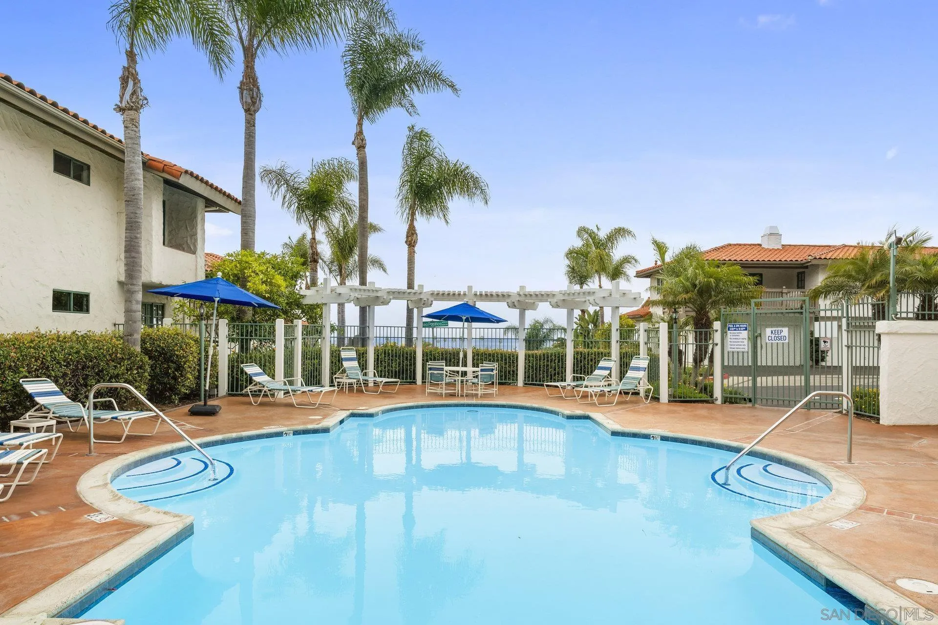 381 Playa Blanca Encinitas, CA 92024 - Photo 26 of 32 a view of a house with swimming pool and porch