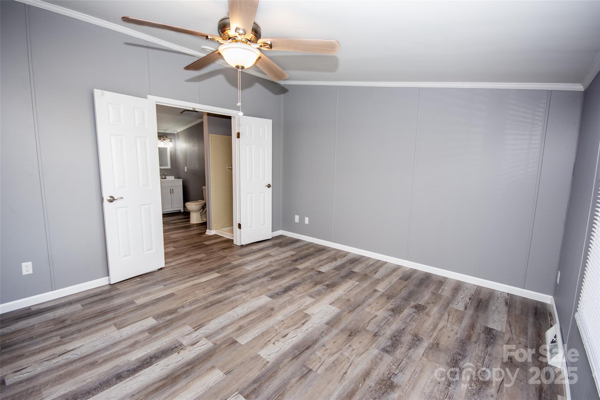 943 Tabor Road Olin, NC 28660 - Photo 11 of 31 wooden floor in an empty room