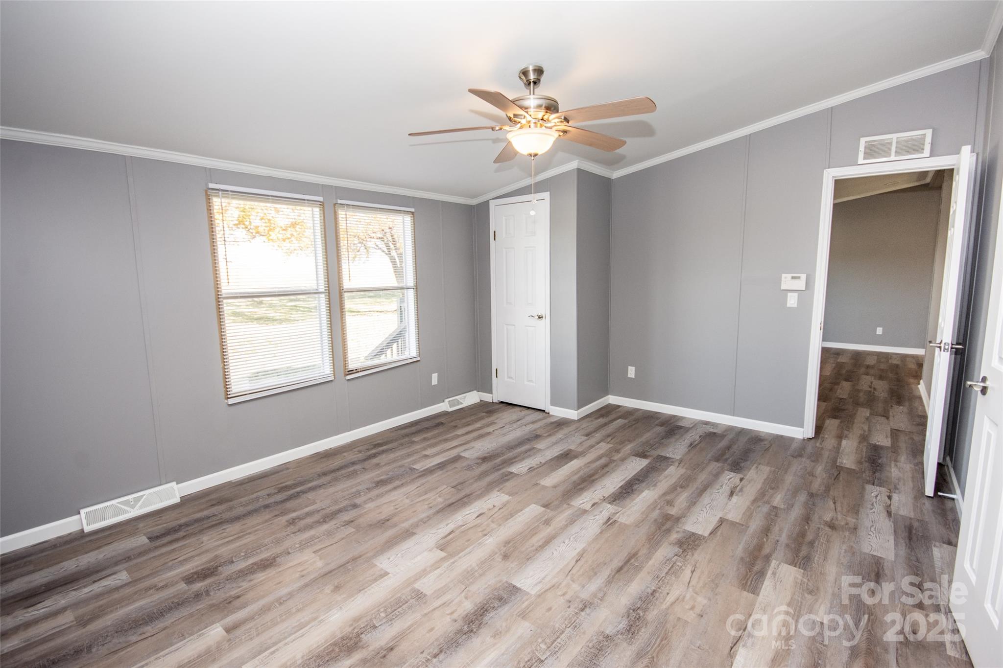 943 Tabor Road Olin, NC 28660 - Photo 13 of 31 a view of an empty room with a window