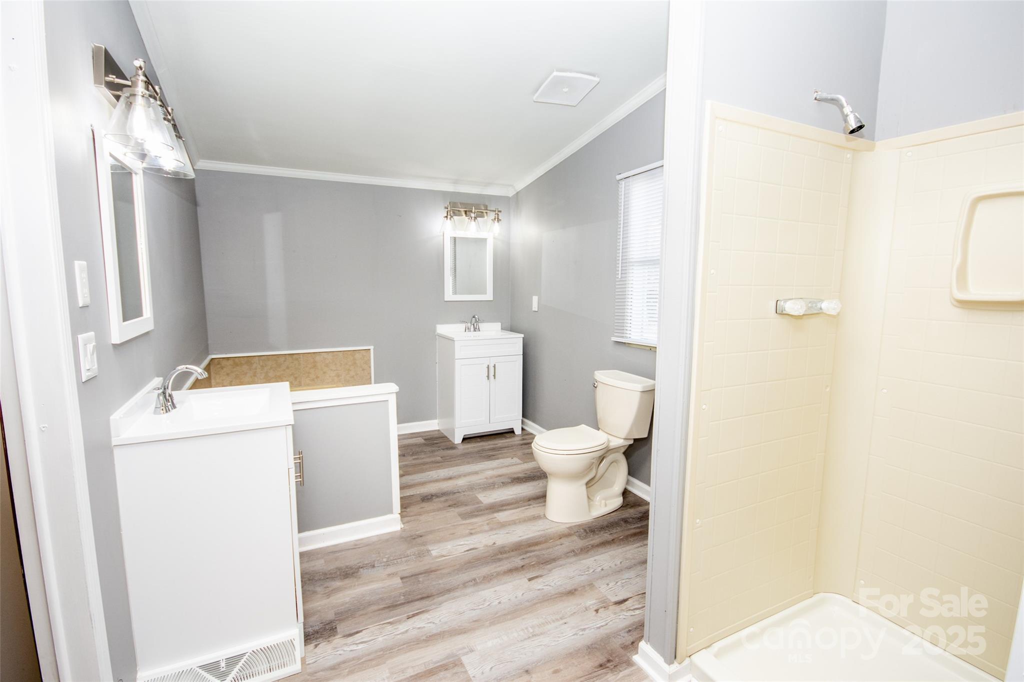 943 Tabor Road Olin, NC 28660 - Photo 14 of 31 a bathroom with a sink toilet and shower