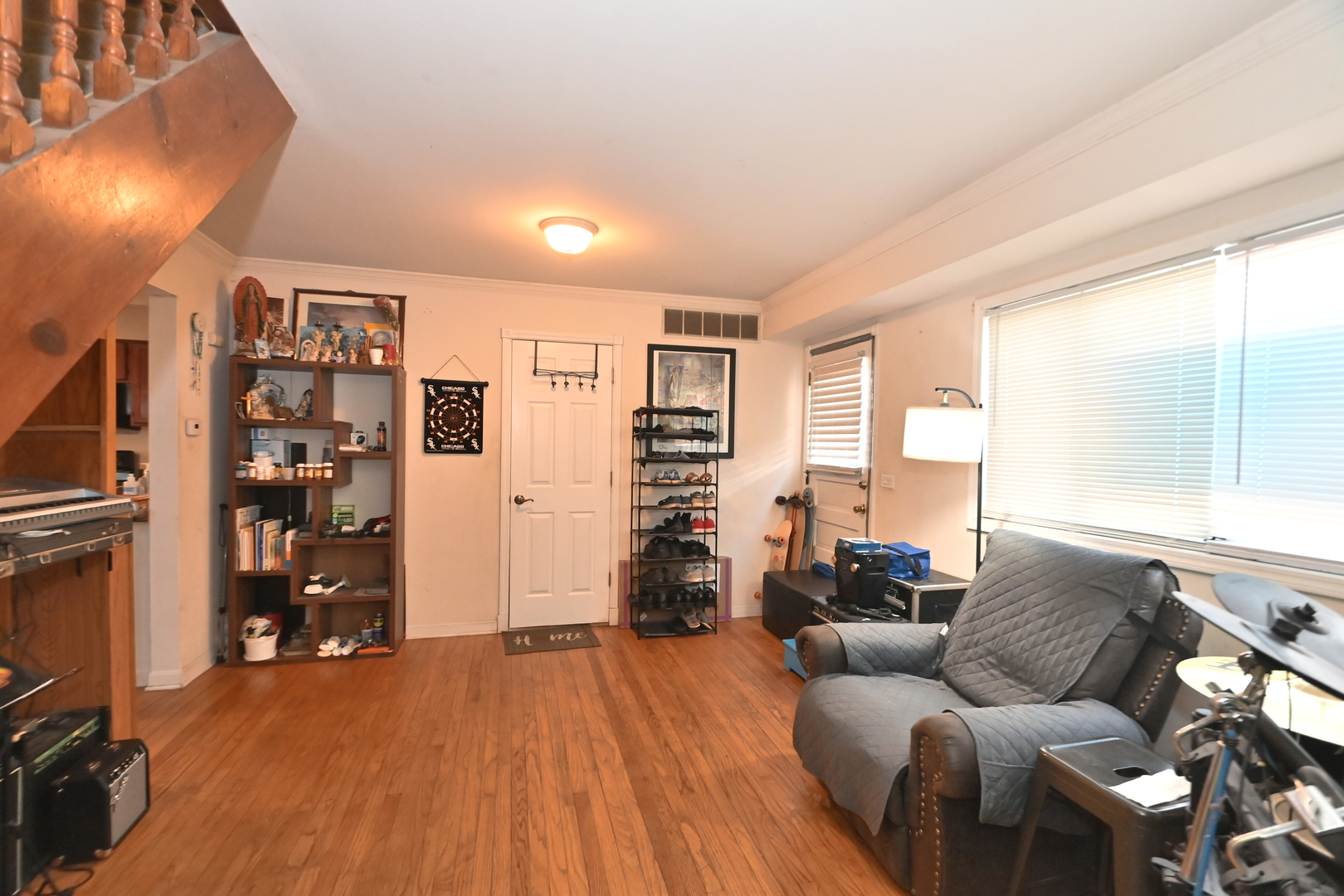 32 1st Street Wheeling, IL 60090 - Photo 6 of 14 a living room with furniture and a flat screen tv