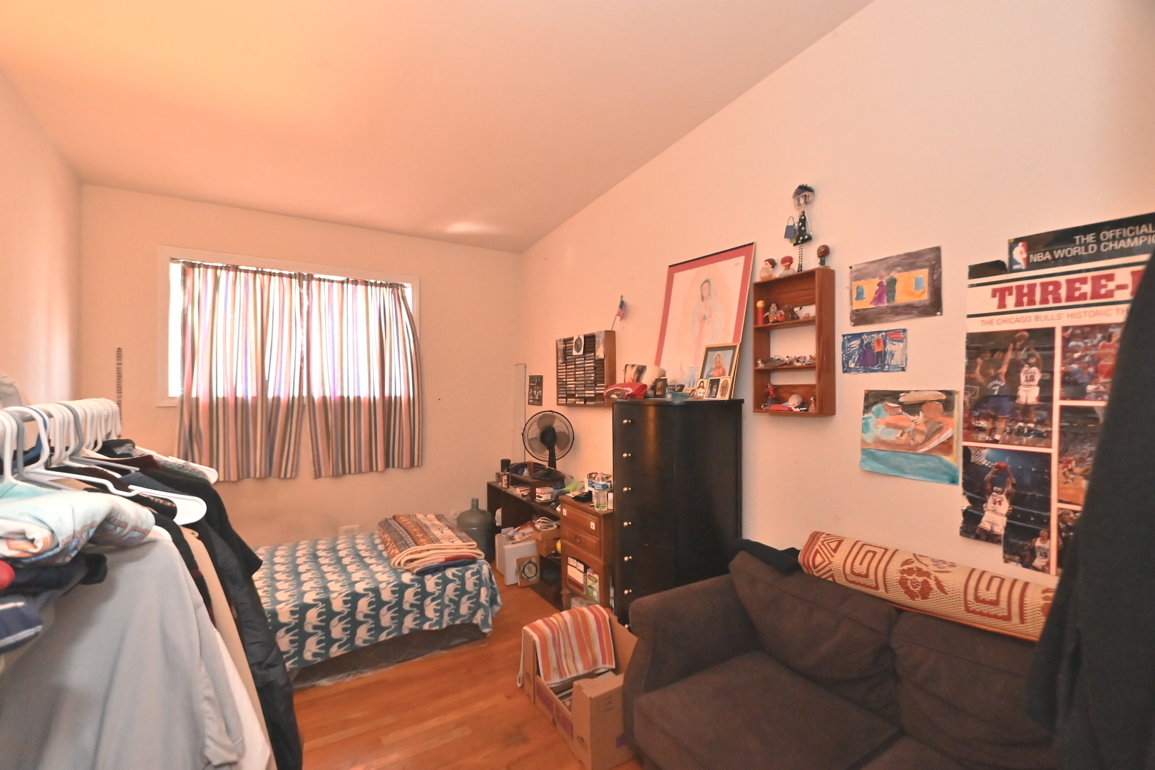32 1st Street Wheeling, IL 60090 - Photo 9 of 14 a bed room with furniture and a window