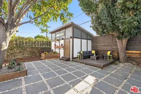 a backyard of a house with seating space