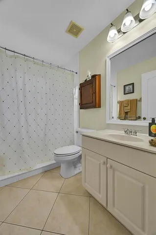 a view of a hallway view with staircase