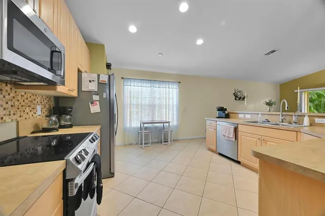 a room that has a couch and a chair