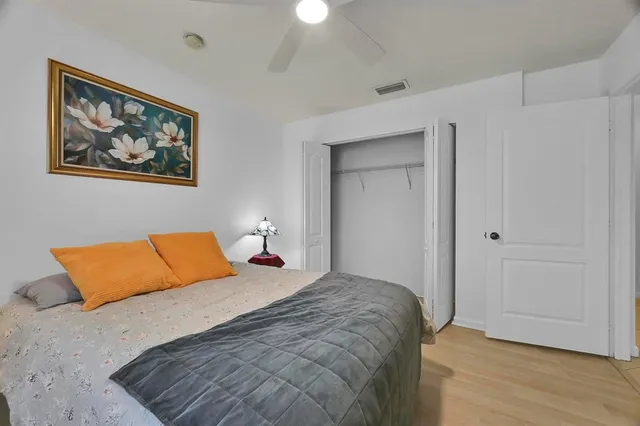 a workspace with furniture hardwood and a window