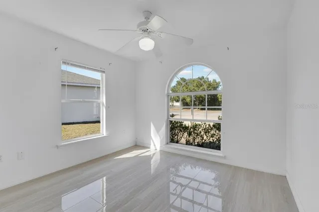 an empty room with windows