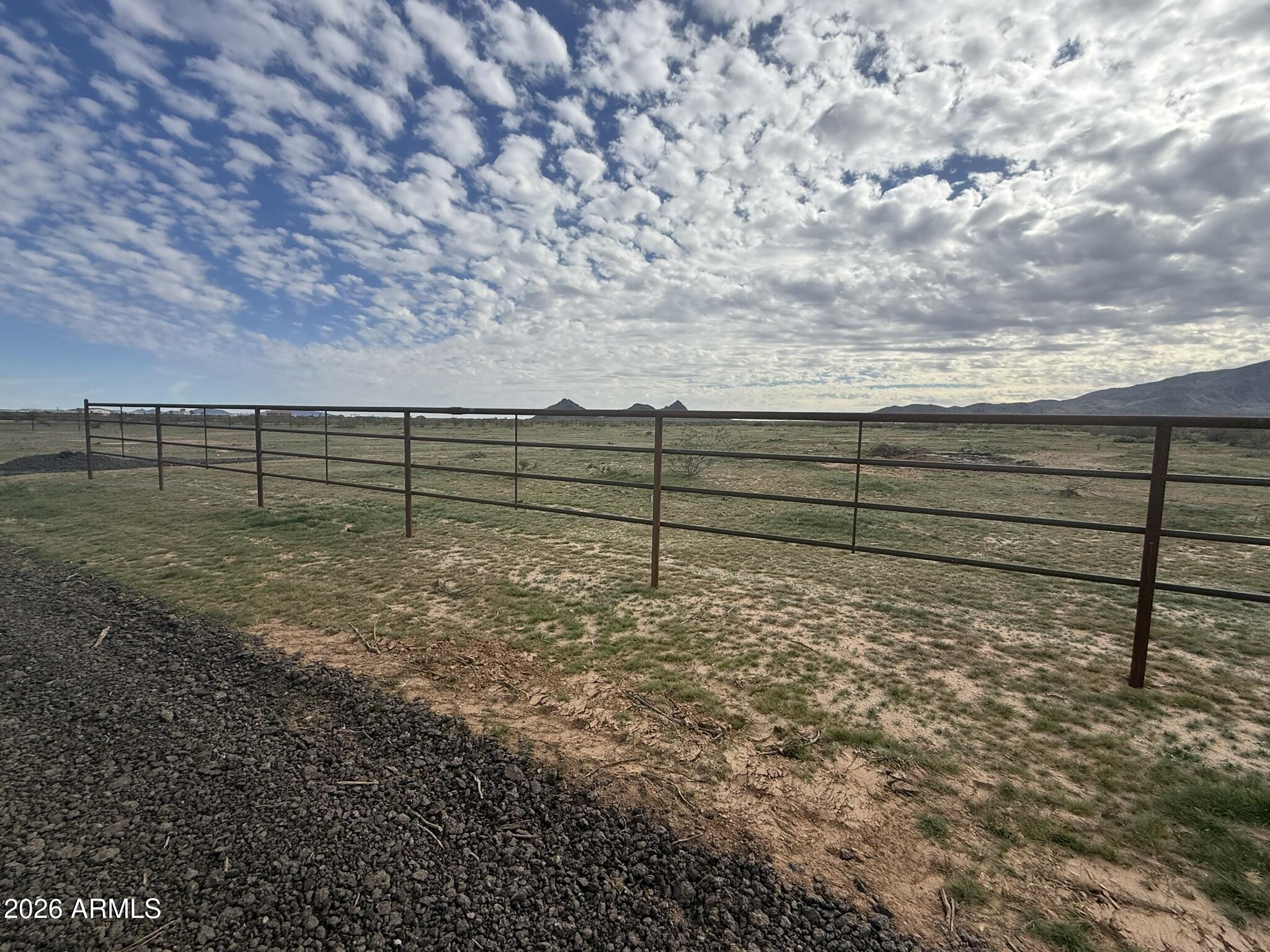 -xxa4 West Williams Road, Unit 5 Aguila, AZ 85320 - Photo 10 of 18 a view of outdoor space with wooden fence
