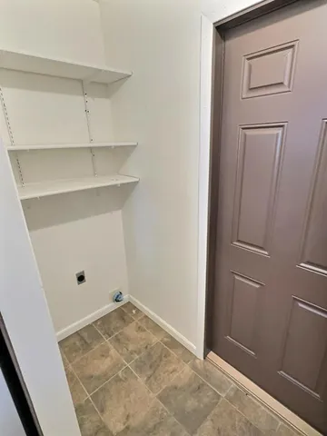 a view of a room with an empty space