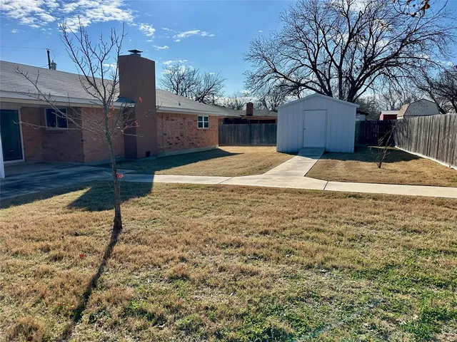 a house with trees in front of it