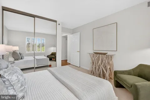 a view of a building with a yard