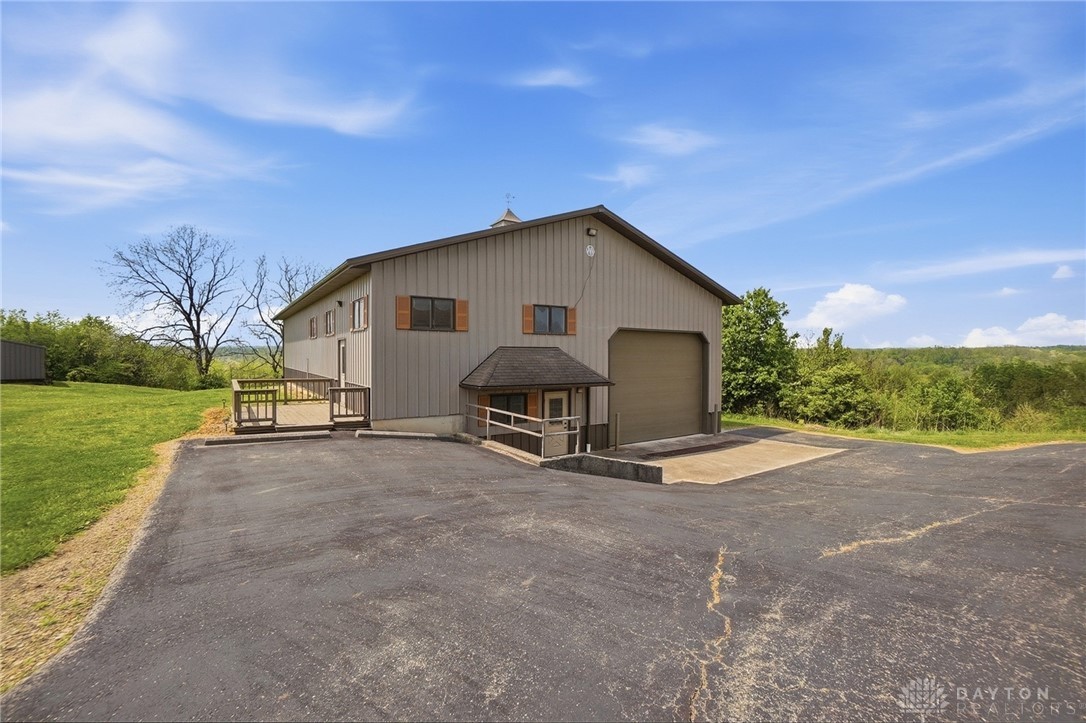 5669 O Neall Road Waynesville, OH 45068 - Photo 53 of 72 This expansive barn-style structure offers versatile space with a functional design and scenic surroundings.