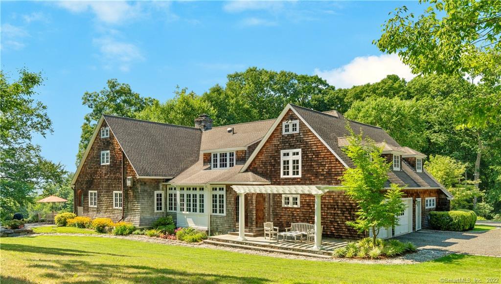 Arbor covered stone patio off the primary suite.