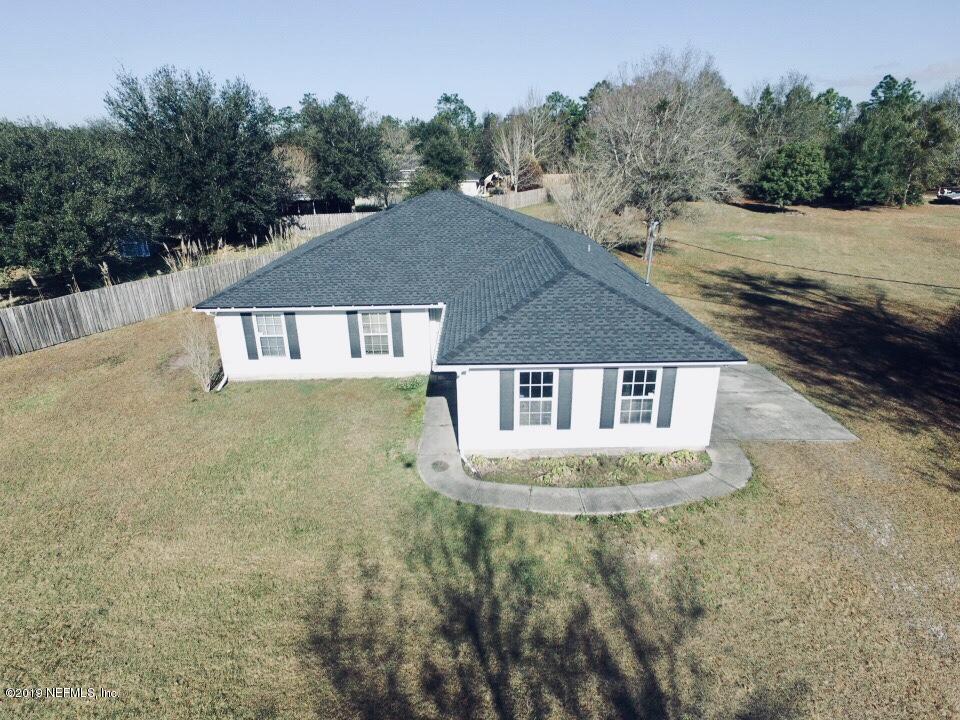 11367 Old Gainesville Road Jacksonville, FL 32221 - Photo 49 of 54 a view of a house with a yard