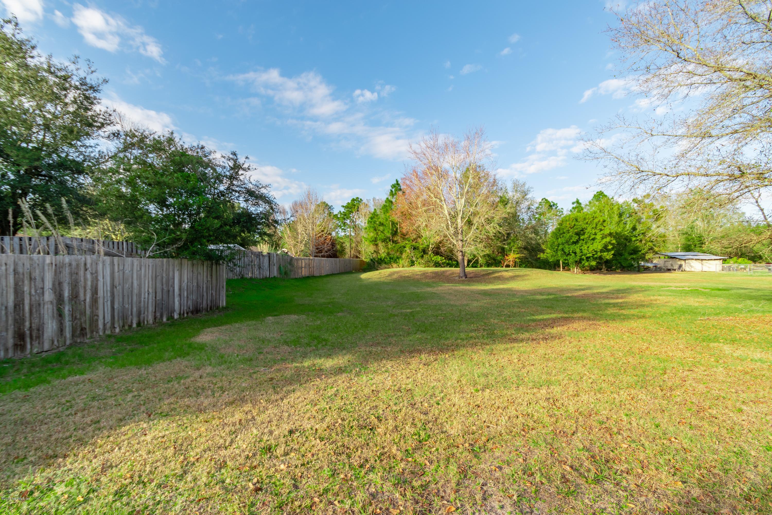 11367 Old Gainesville Road Jacksonville, FL 32221 - Photo 7 of 54 a view of a golf course with a yard