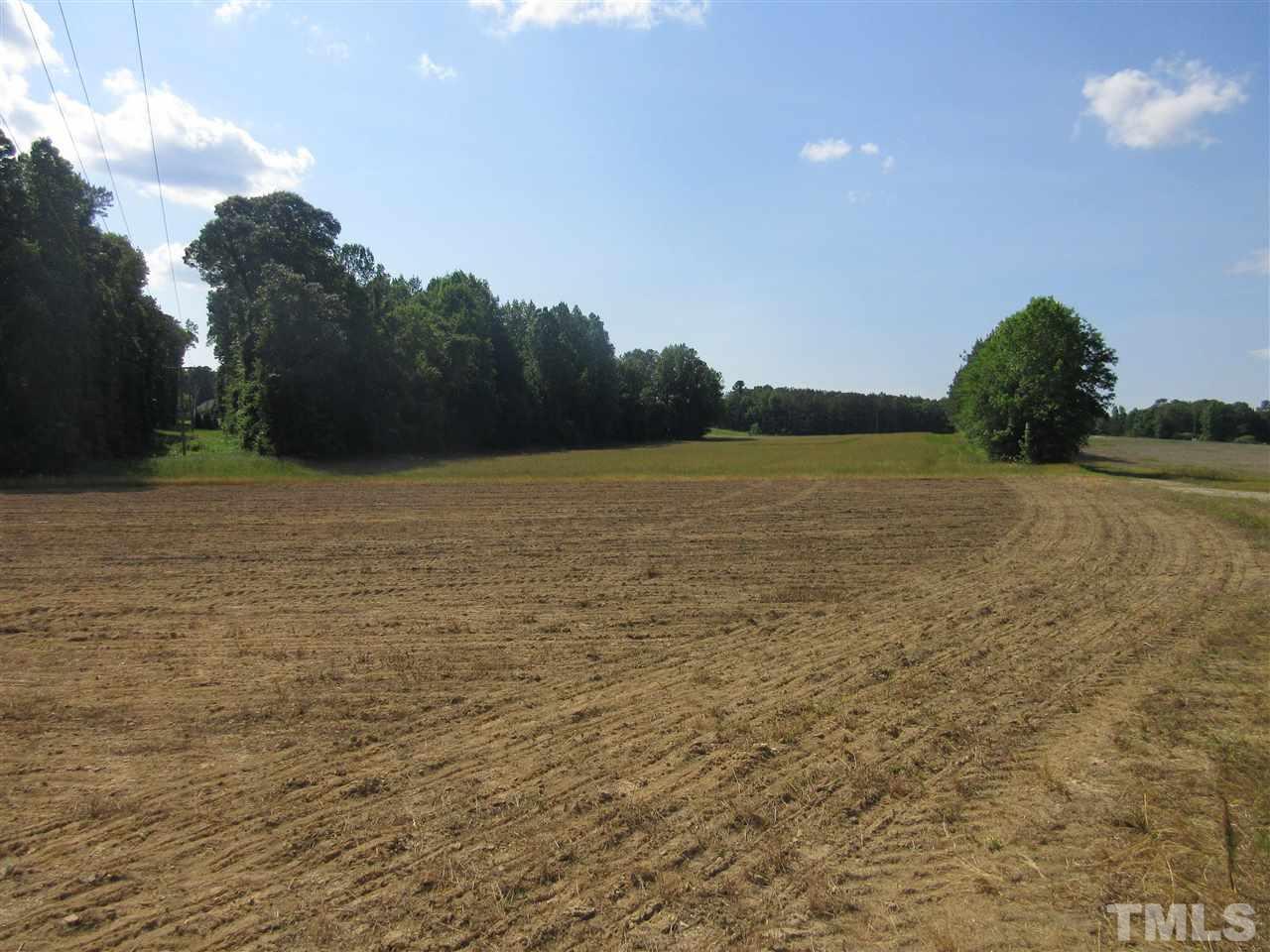 8304 Mitchell Mill Road Zebulon, NC 27597 - Photo 22 of 22 a view of an ocean beach