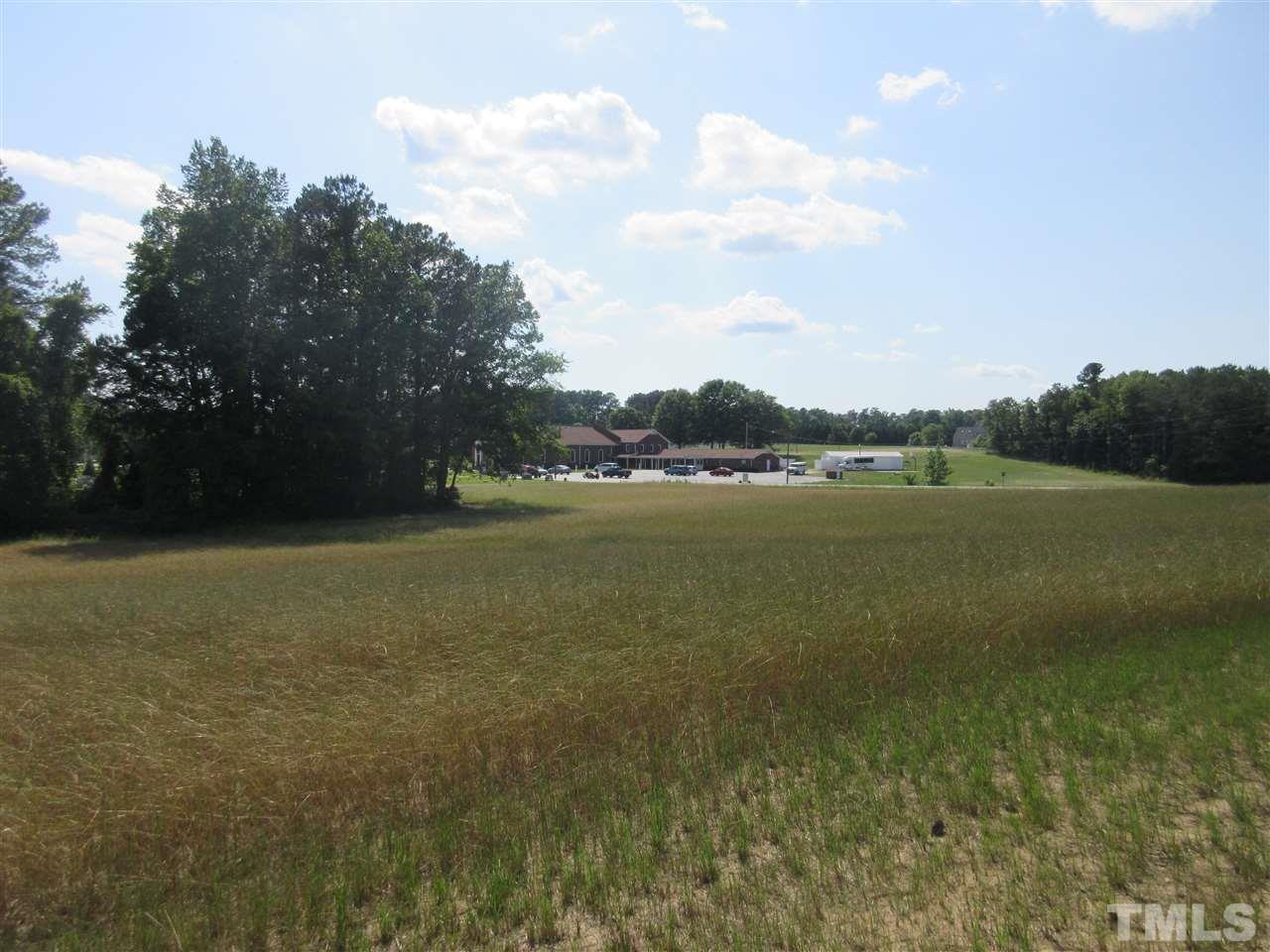 8304 Mitchell Mill Road Zebulon, NC 27597 - Photo 7 of 22 a view of an ocean and beach