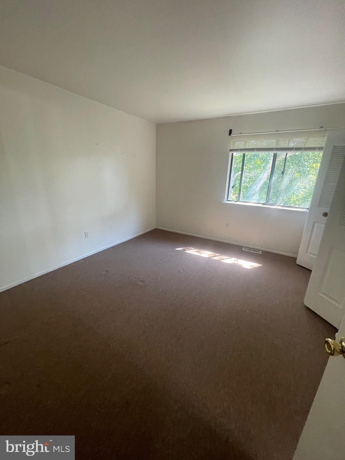 2123 Rhododendron Court Mays Landing, NJ 08330 - Photo 14 of 27 an empty room with windows