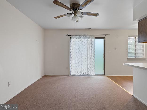 2123 Rhododendron Court Mays Landing, NJ 08330 - Photo 19 of 27 an empty room with windows and fan