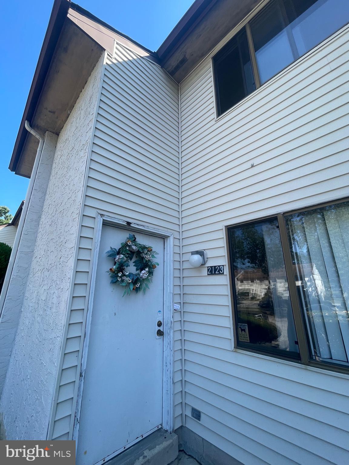 2123 Rhododendron Court Mays Landing, NJ 08330 - Photo 2 of 27 a view of front door and porch with wooden floor