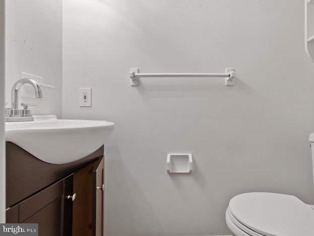 2123 Rhododendron Court Mays Landing, NJ 08330 - Photo 24 of 27 a bathroom with a sink a toilet and a mirror