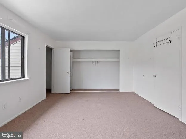 a bathroom with a double vanity sink toilet and shower