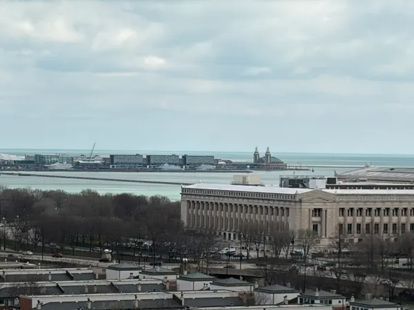 a view of a city and lake