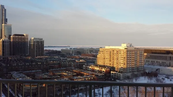a view of a city with tall buildings