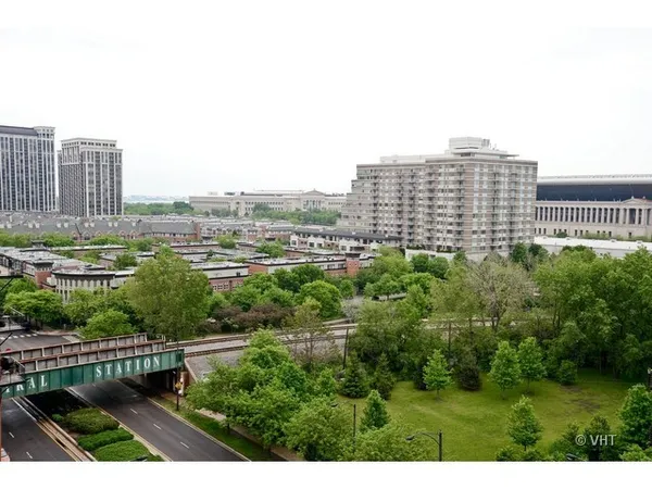 a view of city with tall buildings