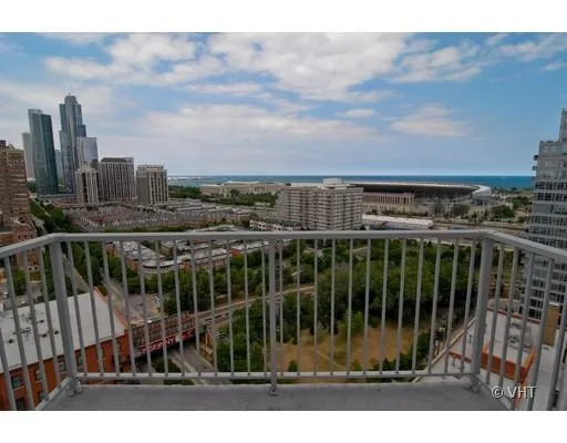 a view of a balcony with city view
