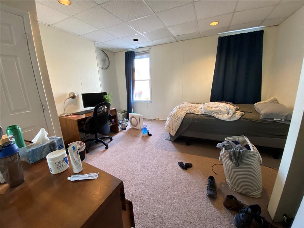 3306 Ward Street Pittsburgh, PA 15213 - Photo 4 of 12 a bedroom with bed and a window