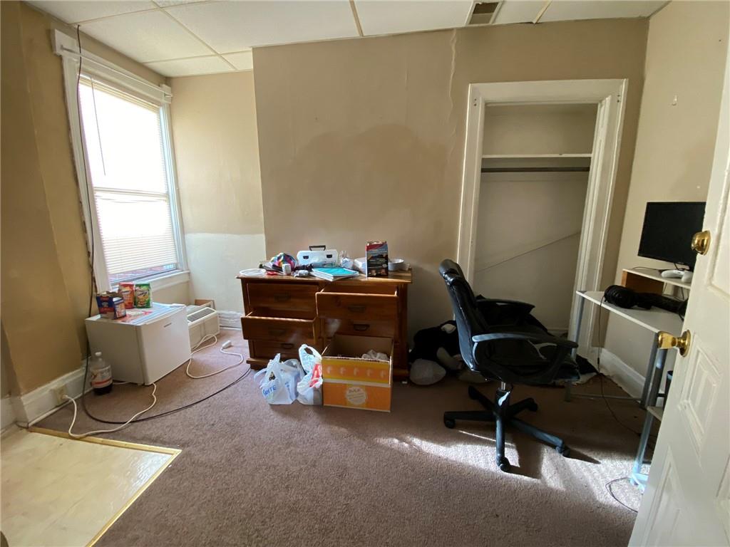 3306 Ward Street Pittsburgh, PA 15213 - Photo 9 of 12 a room with furniture and a window