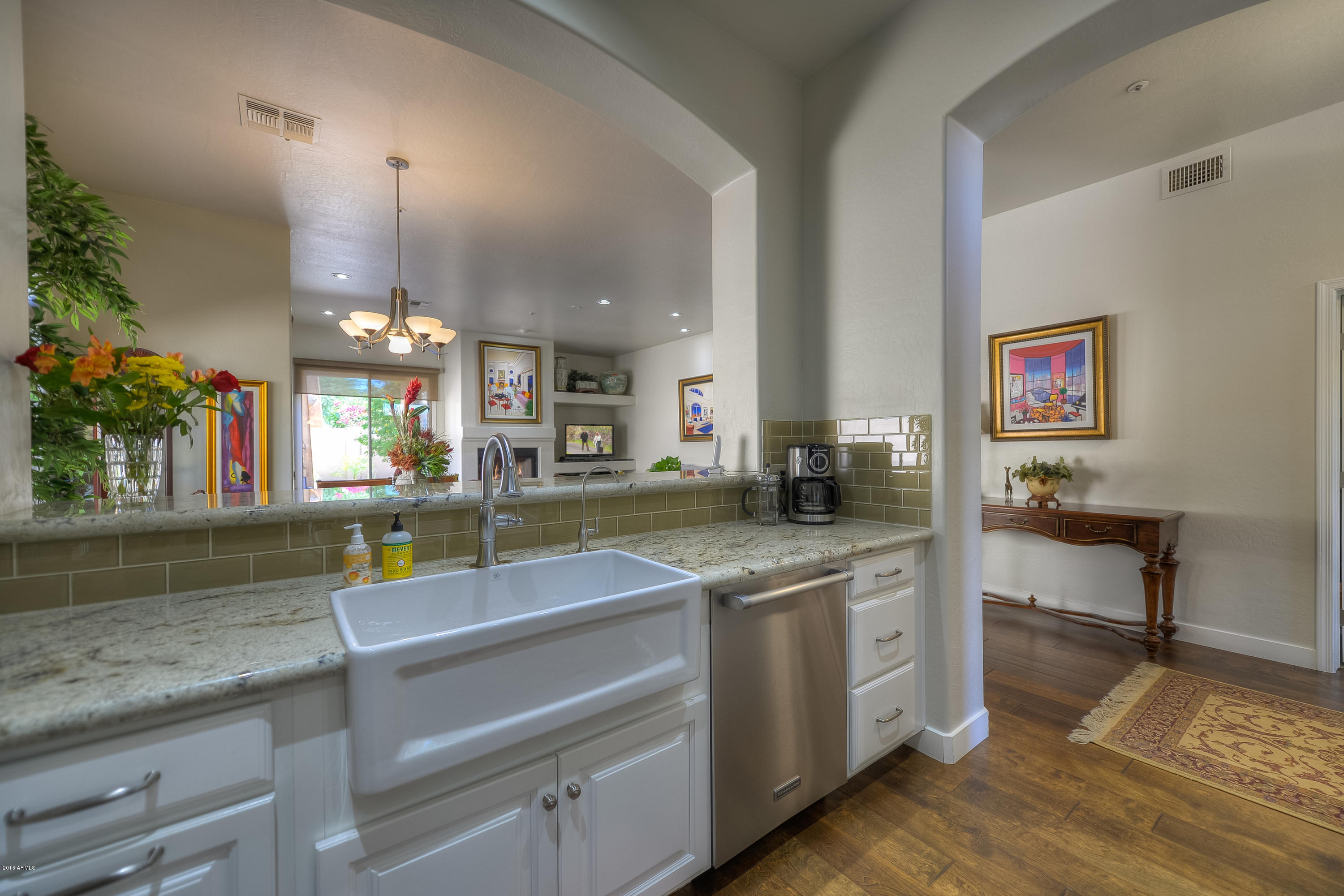 8147 East Beardsley Road Scottsdale, AZ 85255 - Photo 6 of 24 a kitchen with a sink and cabinets