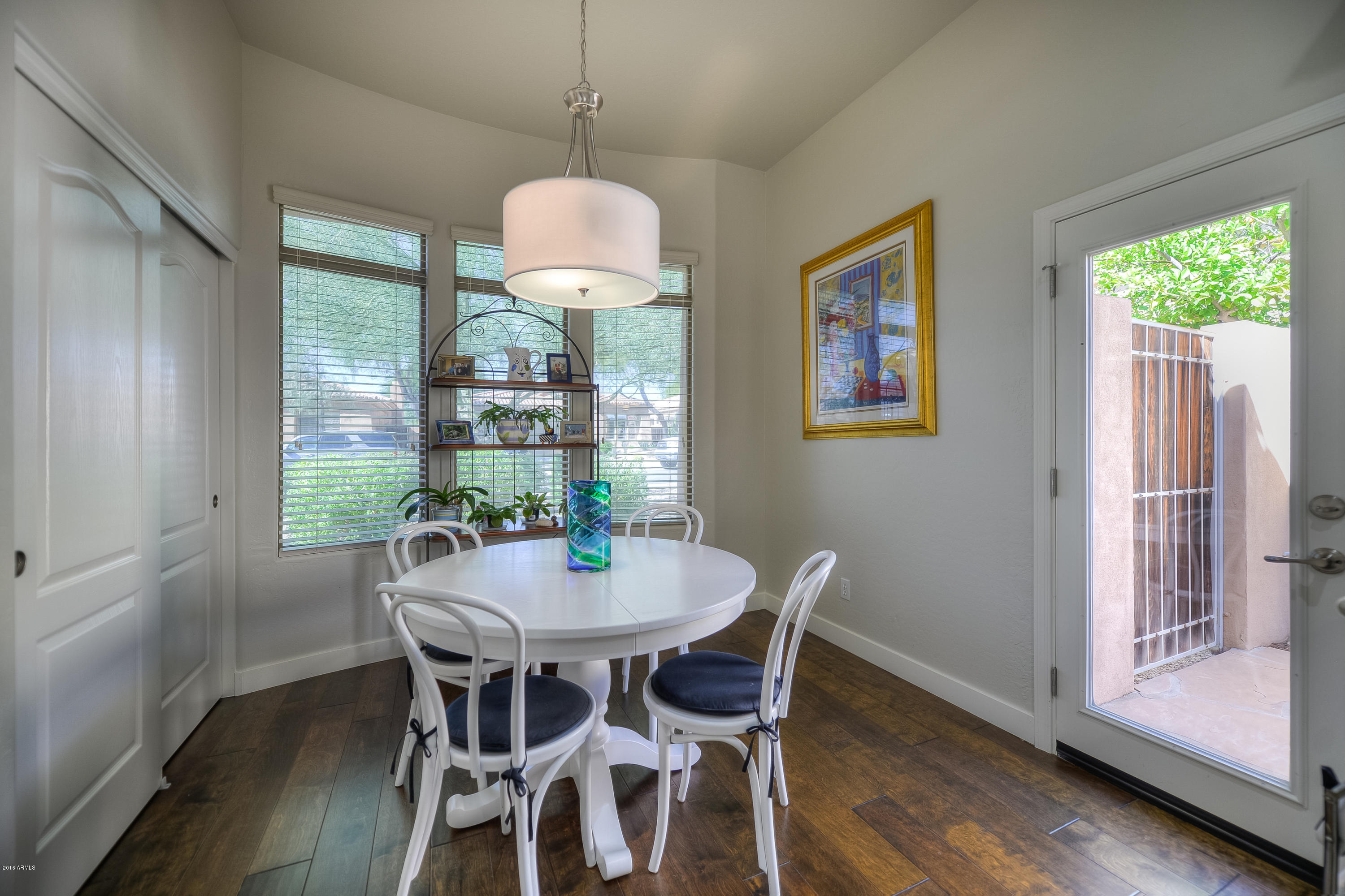 8147 East Beardsley Road Scottsdale, AZ 85255 - Photo 7 of 24 a view of a dining room with furniture window and outside view