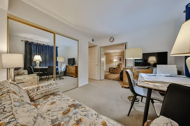 a bedroom with furniture and a bed