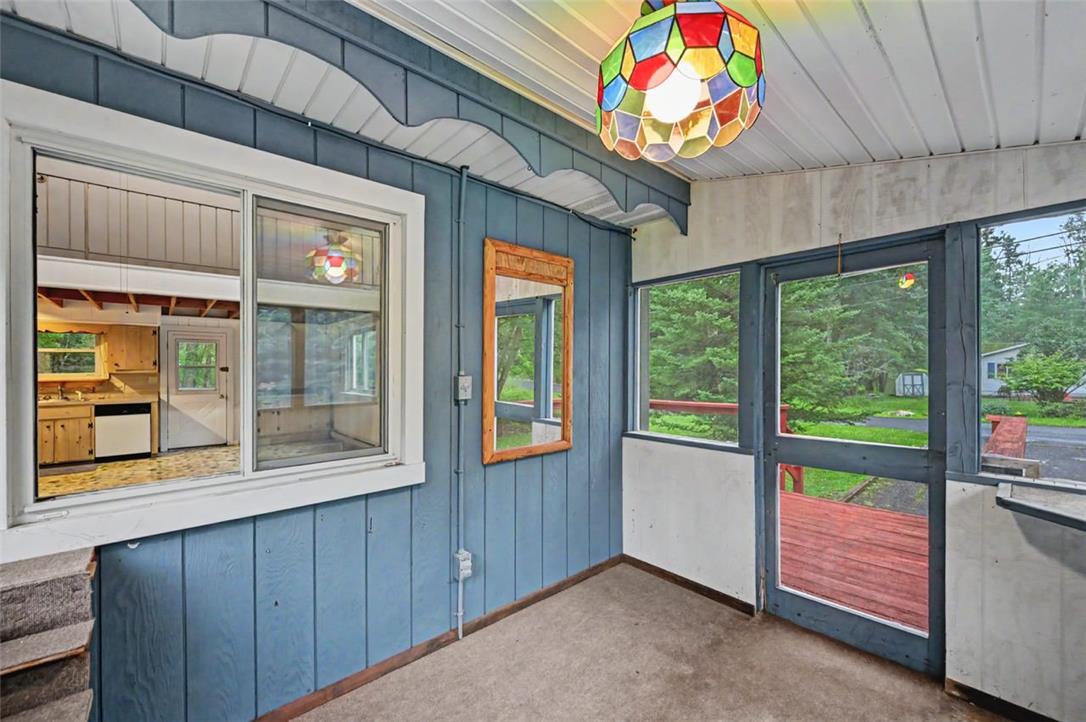 3331 Aspen Road Kunkletown, PA 18058 - Photo 43 of 50 The Screened Porch shares a window with the Living Room--makes a great pass-through from the main house.