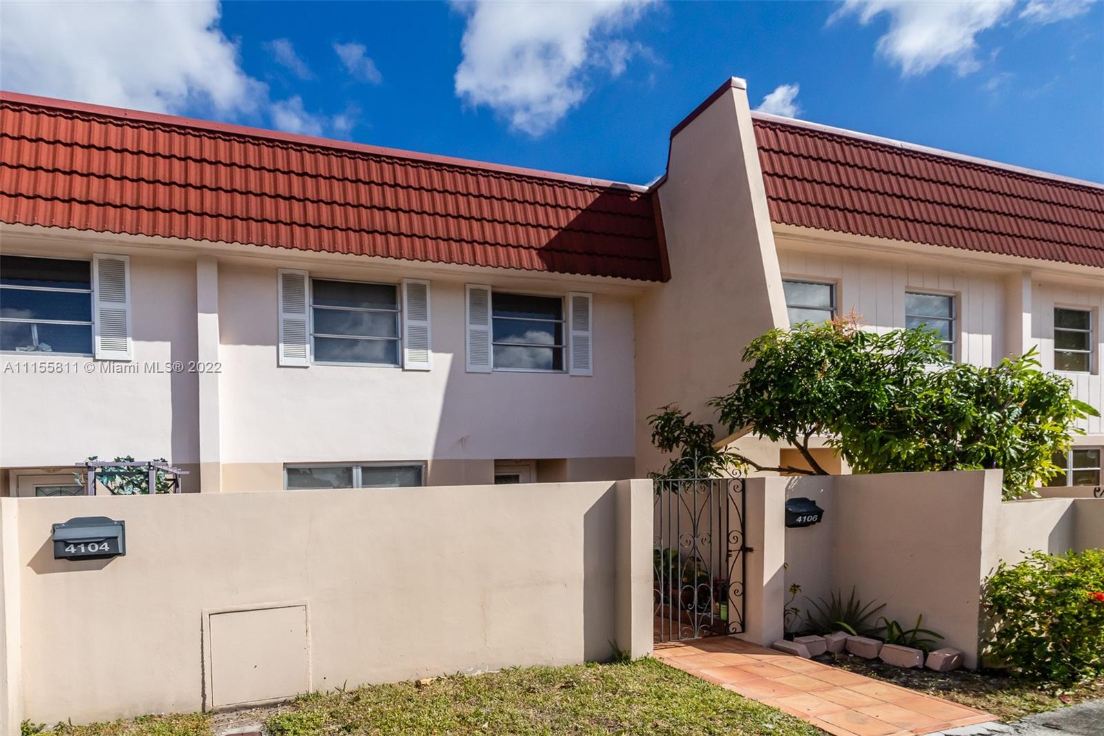 4106 Inverrary Drive, Unit 13C Lauderhill, FL 33319 - Photo 2 of 46 a front view of a house with a yard