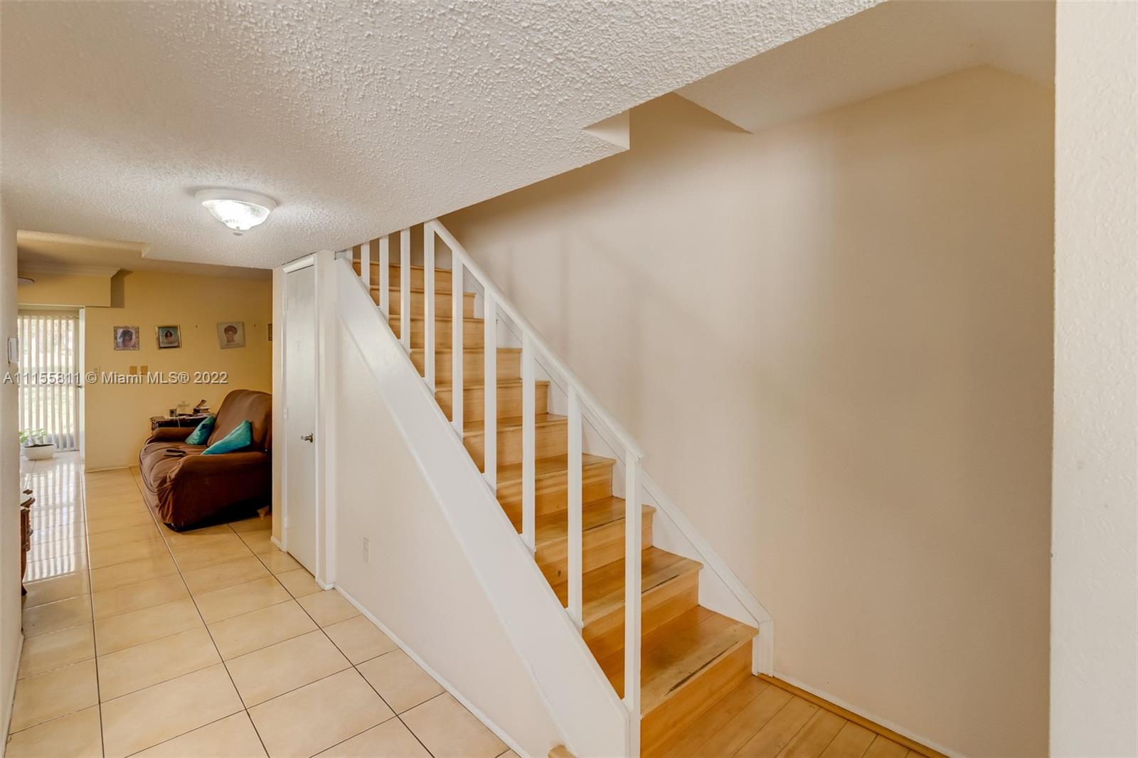 4106 Inverrary Drive, Unit 13C Lauderhill, FL 33319 - Photo 26 of 46 a view of entryway with livingroom