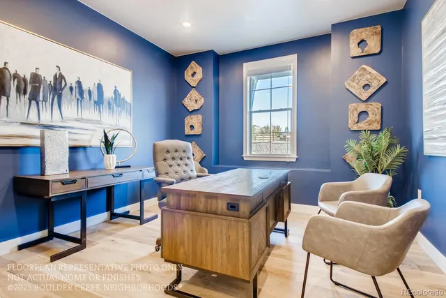 a workspace with furniture and a window