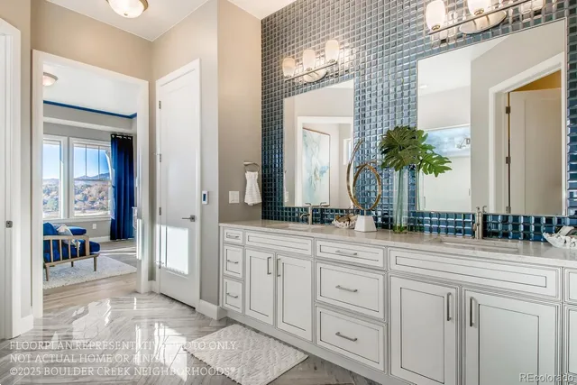 a bathroom with sink and mirror