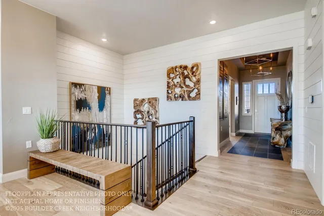 a view of entryway with wooden floor